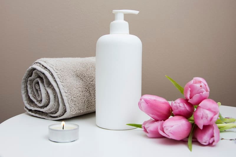 Spa massage stones and candle arrangement